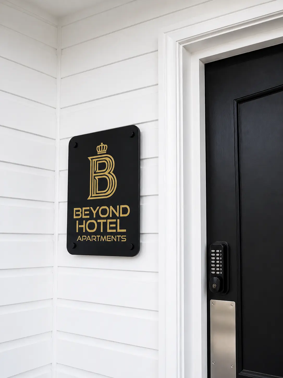 Beyond Hotel Apartments signage at the entrance